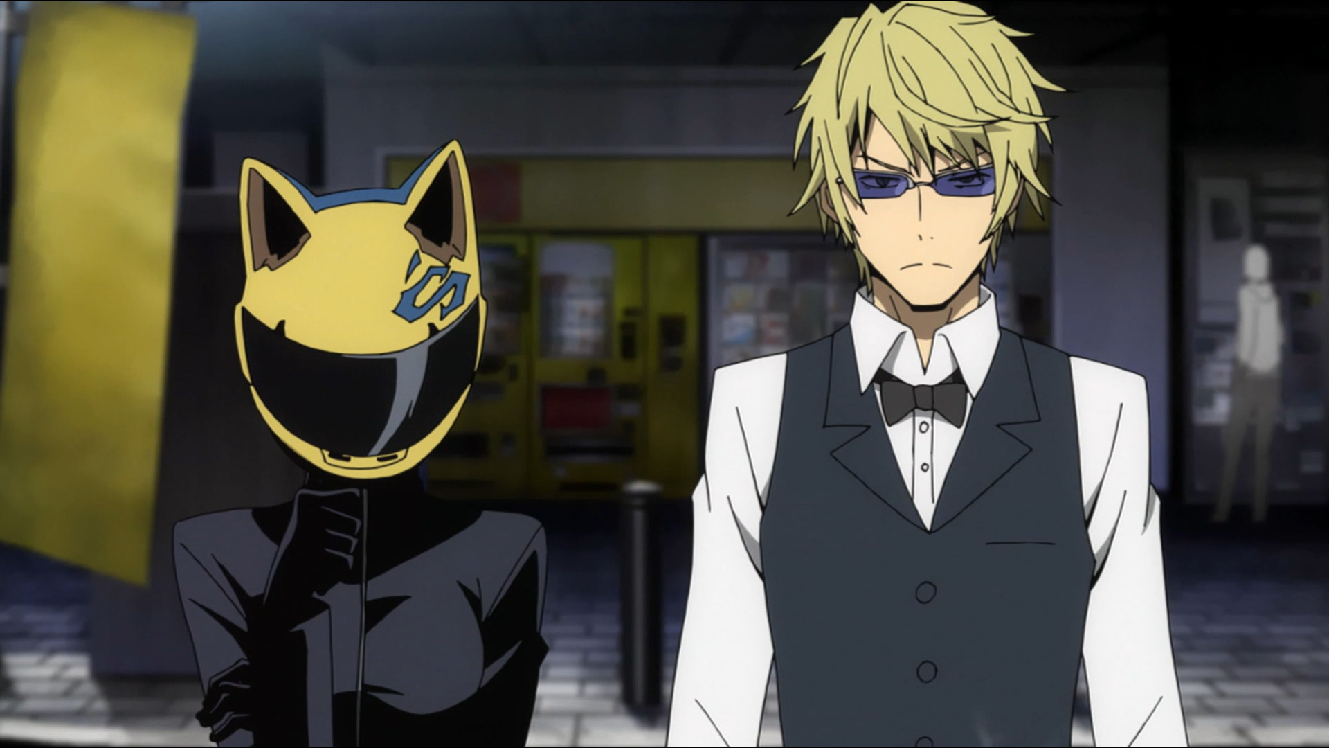 Celty and Shizuo Heiwajima puzzle over a vacant lot in a scene from the Durarara TV Anime.