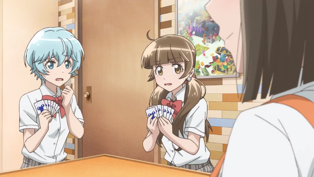 The girls of the After School Dice Club enjoy a challenging card game in the Houkago Saikoro Club TV anime.