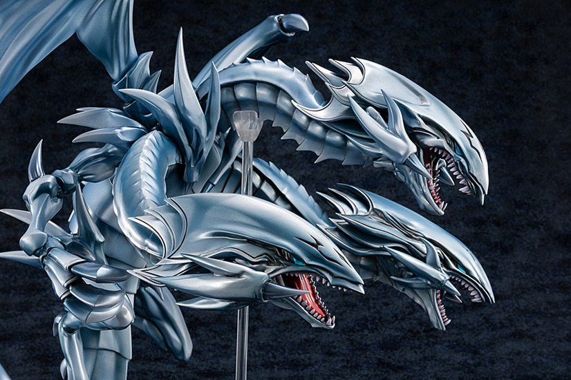 A promotional image showing a profile view of the Yu-Gi-Oh! Duel Monsters Blue-Eyes Ultimate Dragon figure from KAIBA CORPORATION STORE.