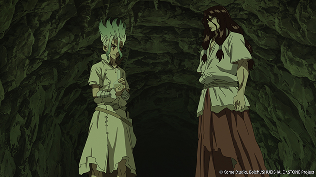 senku and tsukasa stand in a cave in dr. stone