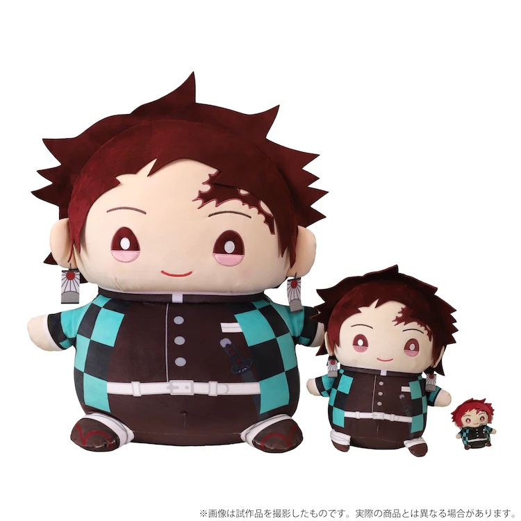 A promotional image featuring (from left to right) the Extra Large Mame Mate, Large Mame Mate, and Mame Mate toys for Tanjiro Kamado from the Demon Slayer: Kimetsu no Yaiba TV anime.
