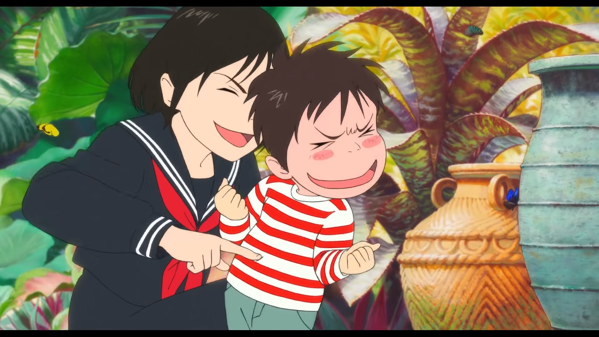 Kun and Mirai tickle each other in a playful scene from Mirai