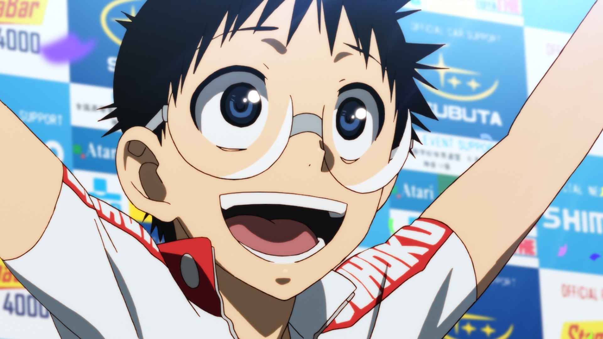 Main character Sakamichi Onodera celebrates on the victor's platform in a scene from the Yowamushi Pedal TV anime.