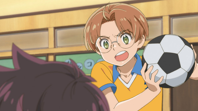 Enta brandishes a soccer ball in a scene from the Sarazanmai TV anime.