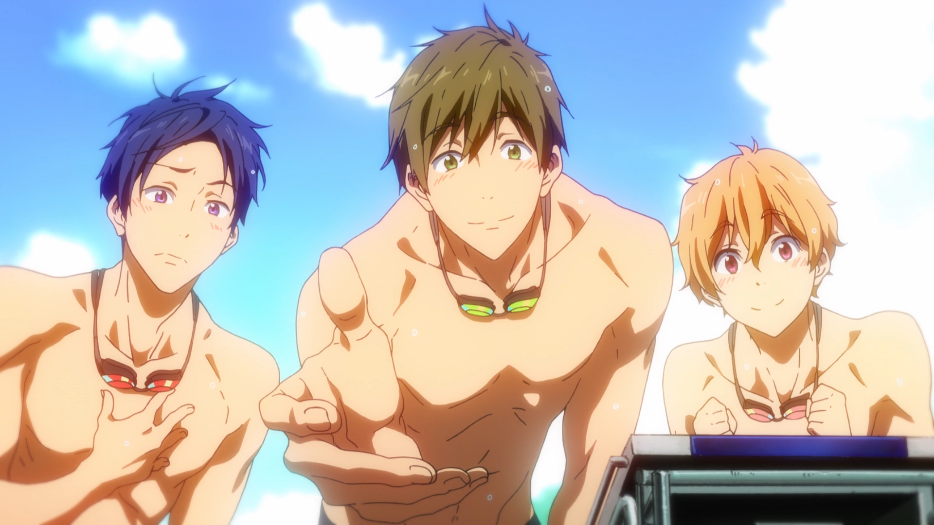 Haruka Nanase's team-mates offer him praise and a hand out of the pool in a scene from the Free! -Iwatobi Swim Club TV Anime.