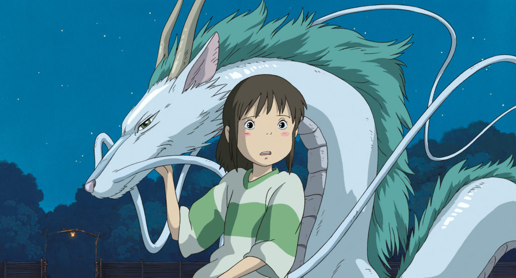 Chihiro and Haku behold a wondrous sight at night in a scene from the 2001 Spirited Away theatrical anime film.