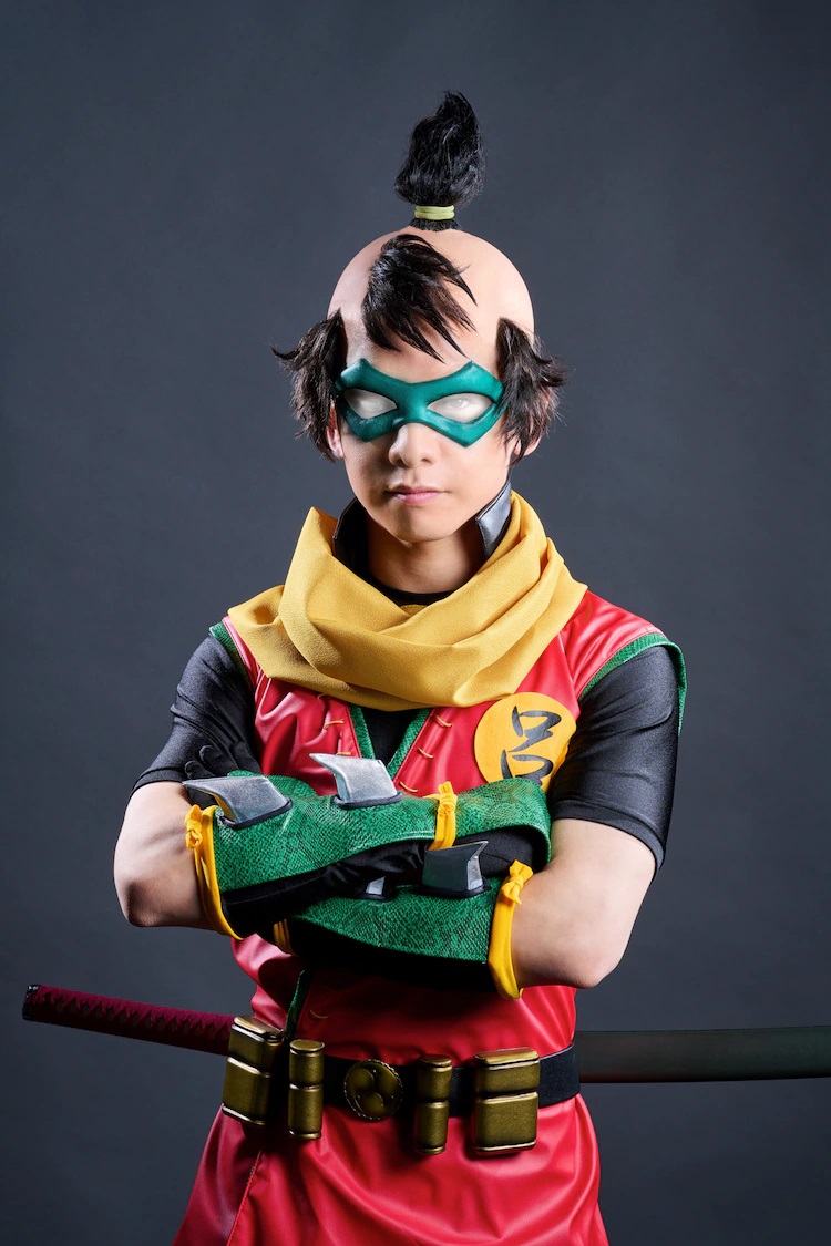 A promo photo of actor Kei Nakamura in full costume and make-up as Robin from the upcoming Batman Ninja The Show stage play.