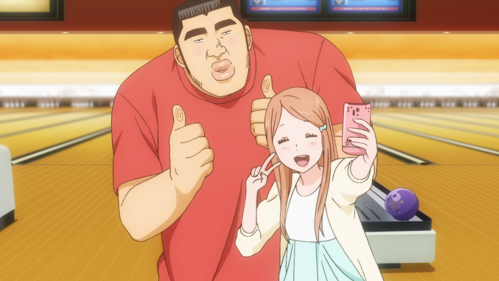 Takeo Goda and Rinko Yamato take a selfie together at a bowling alley in a scene from the MY love STORY!! TV anime.