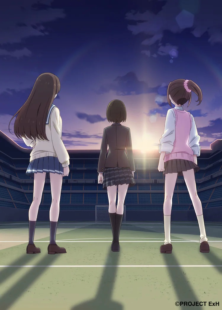 A teaser visual for the upcoming Extreme Hearts original TV anime featuring the main characters - Sumika Maehara, Hiyori Hayama, and Saki Kodaka - striding across a soccer field with their backs the viewers while dressed in their high school uniforms.