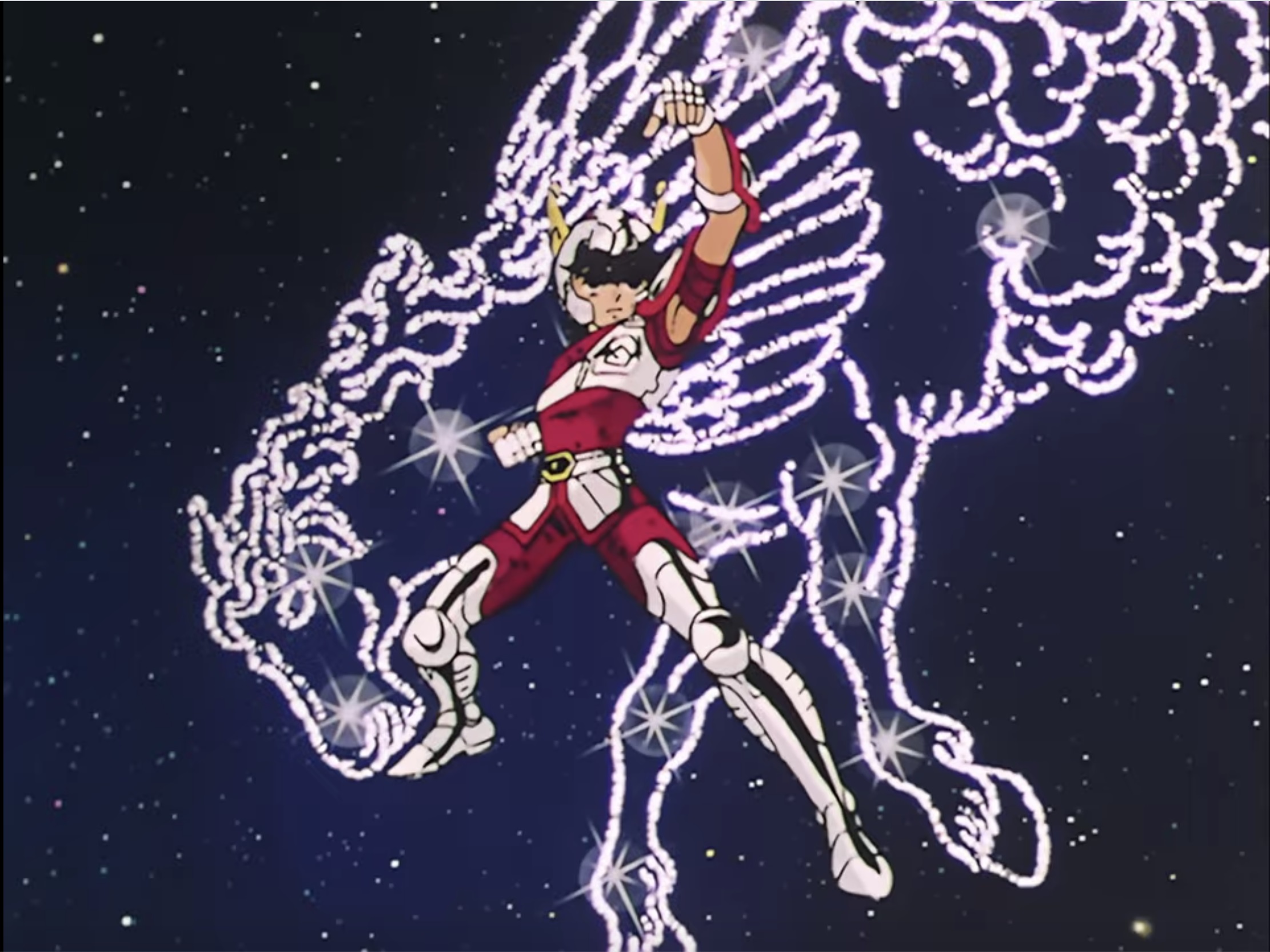 Seiya posiert vor einer Konstellation von Pegasus in einer Szene aus dem Saint Seiya TV-Anime von 1986 - 1989.