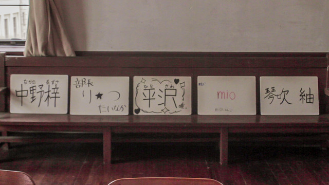 The girls from K-ON! name cards in real life