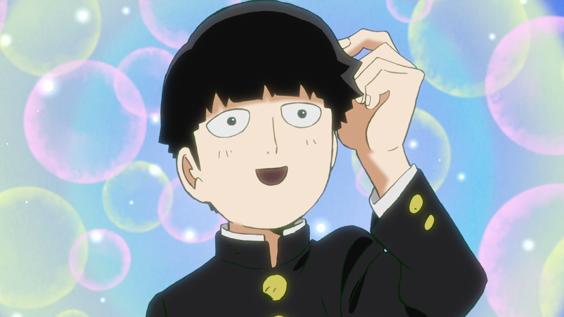 Shigeo Kageyama, aka "Mob", expresses contentment over a threat that he mistakes as flattery in a scene from the Mob Psycho 100 TV anime.