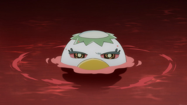 Prince Keppi floats in a pool of red liquid with a somewhat menacing expression on his face in a scene from the Sarazanmai TV anime.