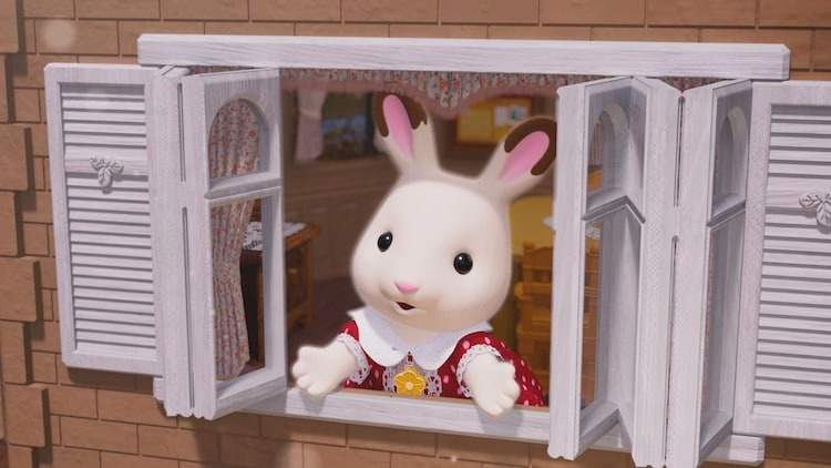 Freya, ein Kaninchenmädchen, blickt in einer Szene aus dem kommenden 3DCG-Anime-Kinofilm „Sylvanian Families“ aus dem offenen Fenster ihres Familienhauses.