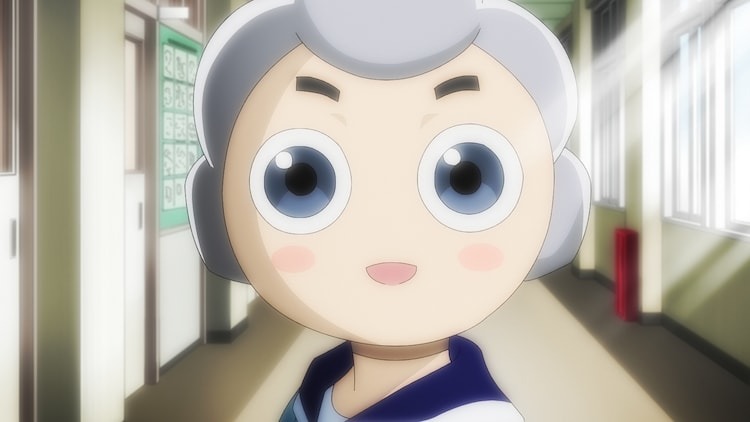 Parma, a humanoid robot designed to mimic an elementary school age human child, smiles in the hallway of a school in a scene from the upcoming AI no Idenshi TV anime.
