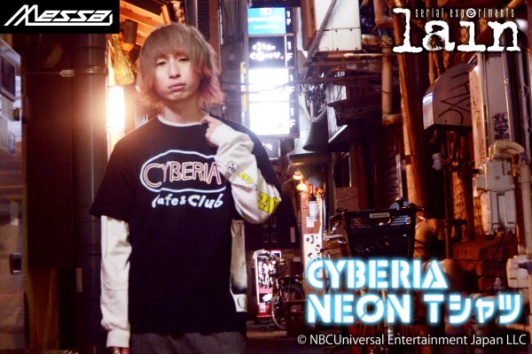 A promotional image of the Serial Experiments Lain Cyberia Cafe & Club T-shirts created by messa. A male model poses for the camera in a cyberpunk environment while wearing the T-shirt.