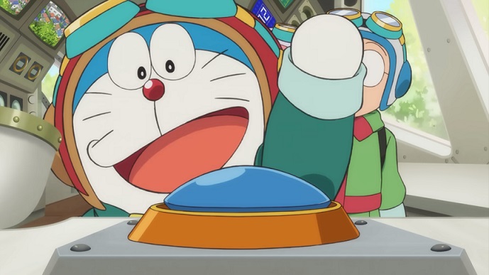 Doraemon prepares to press a big blue button to activate his airship in a scene from the upcoming Doraemon: Nobita's Sky Utopia theatrical anime film.