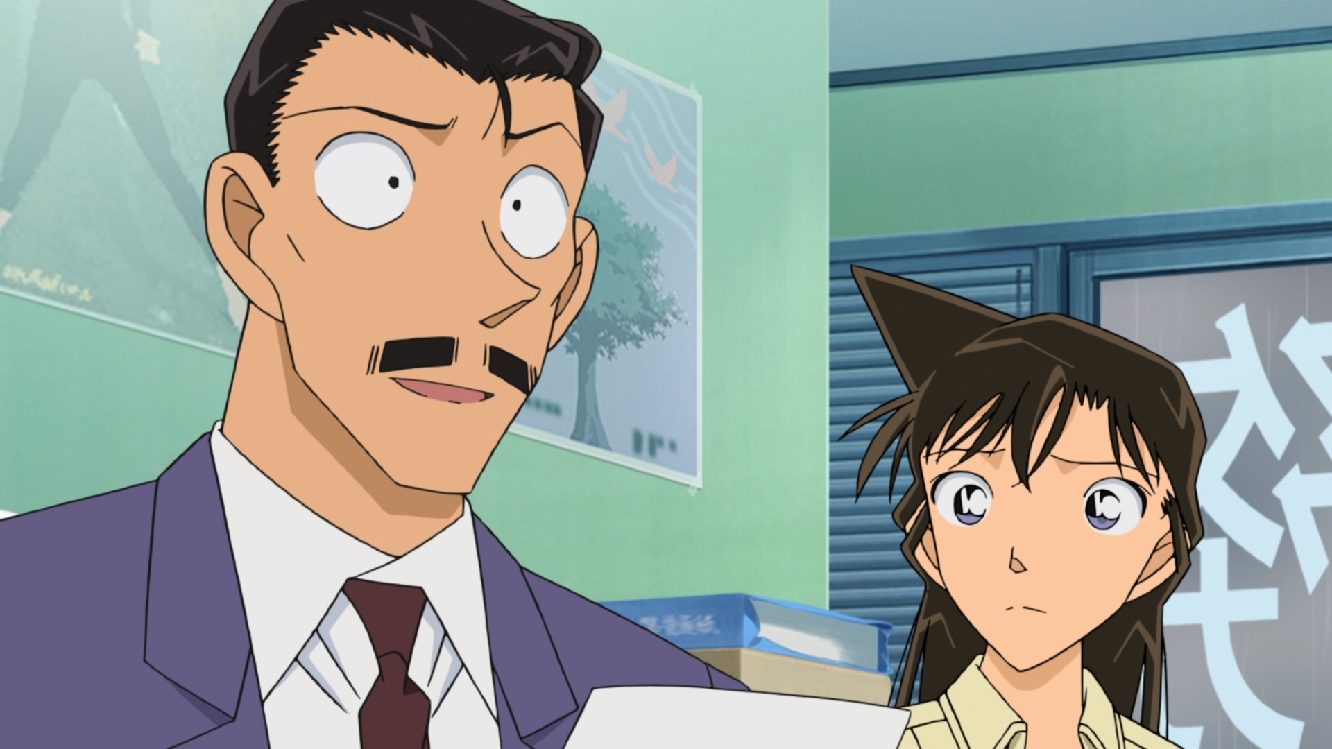 Kogori Mori attempts to comfort a potential client in a scene from the Case Closed / Detective Conan TV anime.