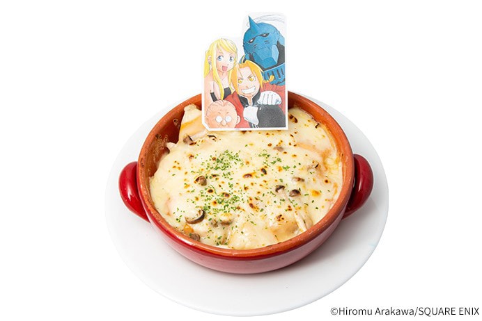 A promotional image of a potatoes au gratin dish served at the Fullmetal Alchemist collaboration café in Shinjuku.