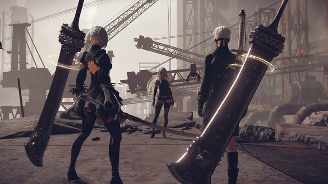 2B and 9S confront A2 in a desolate industrial zone in a scene from the NieR:Automata video game for PlayStation 4, PC, and Xbox One.