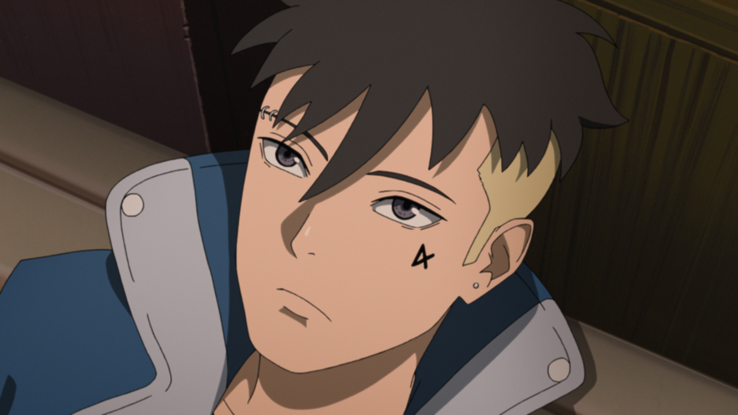 Kawaki stares upward with a blank expression on his face in a scene from the BORUTO: NARUTO NEXT GENERATIONS TV anime.
