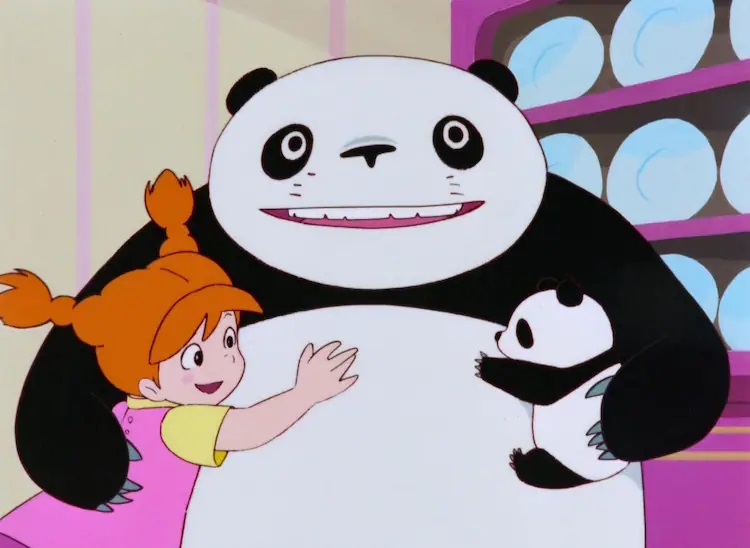 Mimiko, Papanda, and Panny Panda share a big group hug in a scene from the 1972 Panda! Go Panda theatrical anime short film.