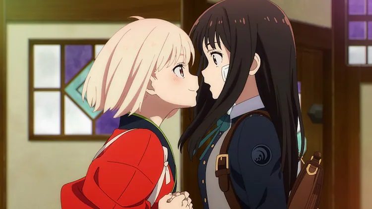 Chisato enthusiastically invades Takina's personal space in a scene from the upcoming Lycoris Recoil TV anime.