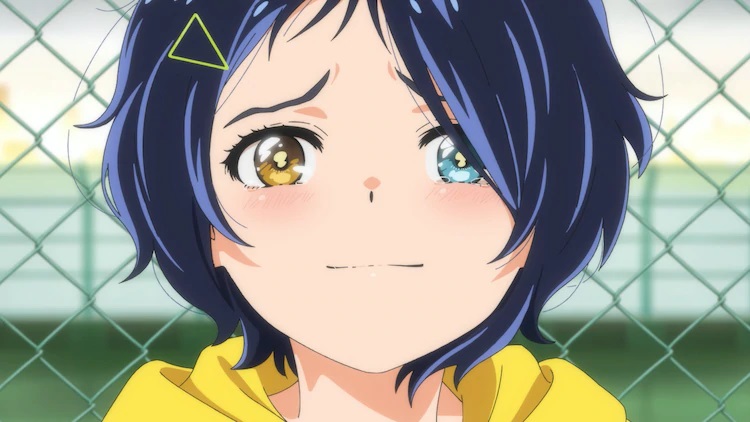 Ai Ohta offers a tearful smile in a scene from the Wonder Egg Priority TV anime.