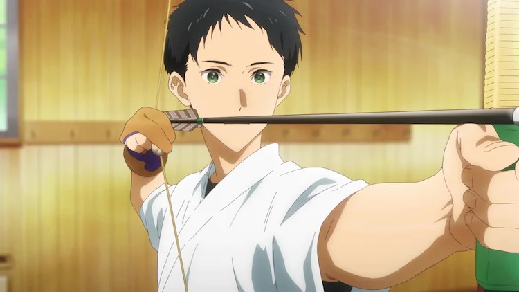 High school student Minator Naruymiya takes aim with a long bow at an archery range while wearing the traditional garb of a kyudo practicioner in a scene from the upcoming Gekijouban Tsurune -Hajimari no Issha- theatrical anime film.