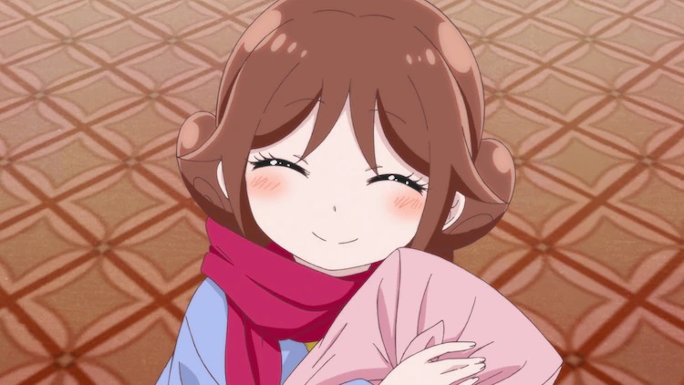 Yuzuki Tachibana smiles while delivering a bundled package in a scene from the upcoming Taisho Otome Otogi Banashi TV anime.