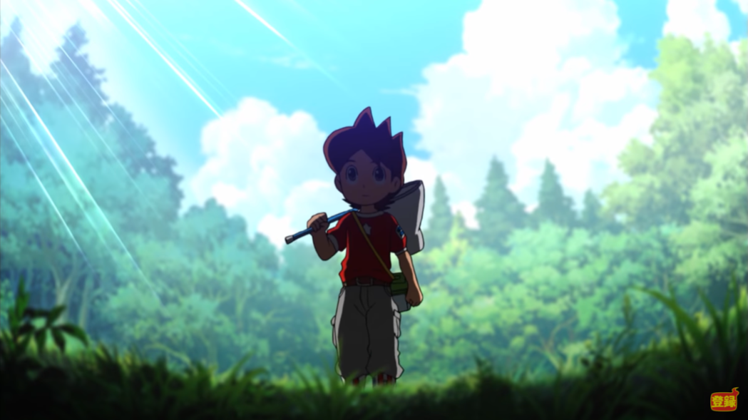 Protagonist Keita Amano wanders in a field near the woods while carrying a butterfly net in a scene from the upcoming Yo-Kai Watch♪ TV anime.