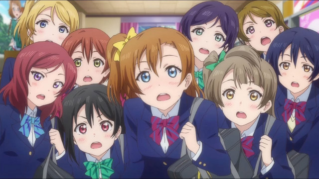 The girls of μ’s receive some surprising news in a scene from Love Live! The School Idol Movie.