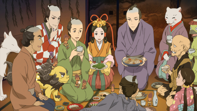 A friendly group of ayakashi gathers together with their human master for a meal in a scene from the special animation video celebrating the 20th anniversary of the Shabake fantasy novel series by Megumi Hatakenaka.