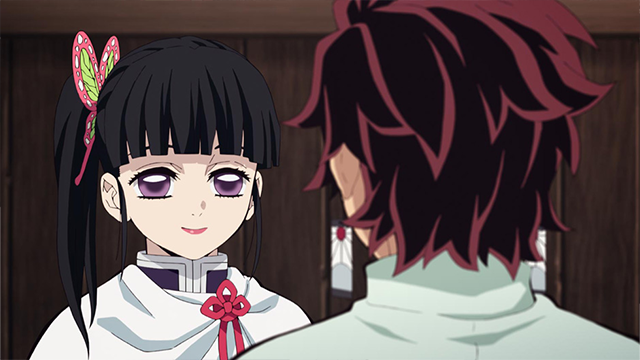 While Tanjiro recuperates from his injuries at a special hospital, Kanao Tsuyuri and Tanjiro Kamado engage in a one-sided conversation in a scene from the Demon Slayer: Kimetsu no Yaiba TV anime.