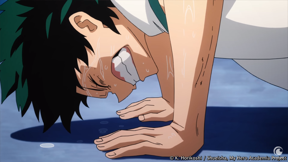 Izuku Midoriya (aka "Deku") struggles to perform push-ups in a scene from the My Hero Academia TV anime.