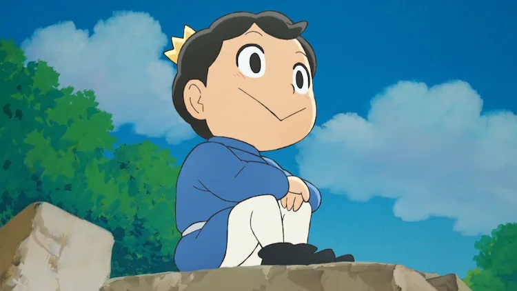 Sitting atop a stone rampart, Prince Bojji dreams of being a great king one day in a scene from the upcoming Ousama Ranking TV anime.