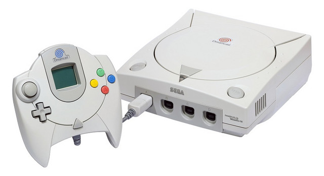 A picture of the Sega Dreamcast home video game console and its unique controller.
