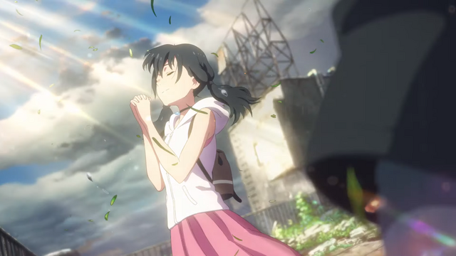 Heroine Hina Amano prays the rain away in Makoto Shinkai's Weathering With You anime theatrical film.